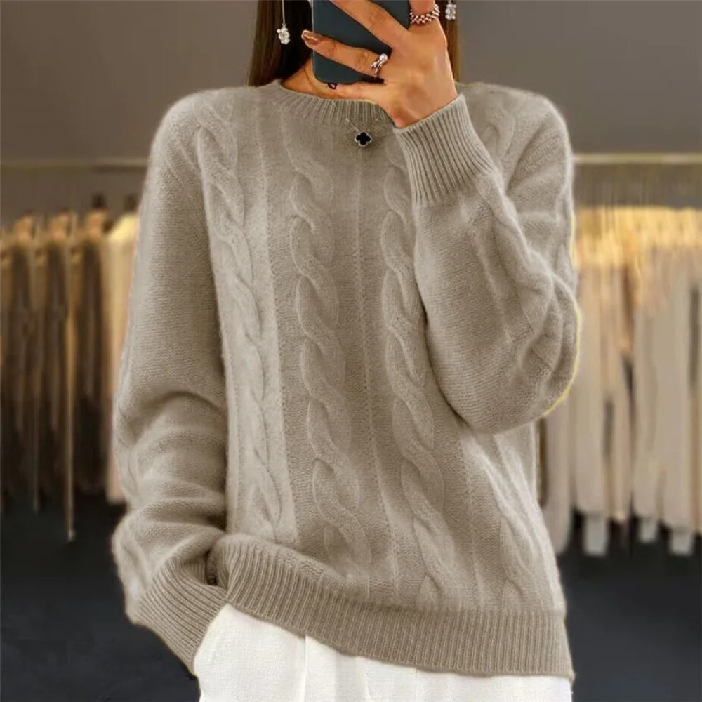 Soft knitted sweater with cable pattern