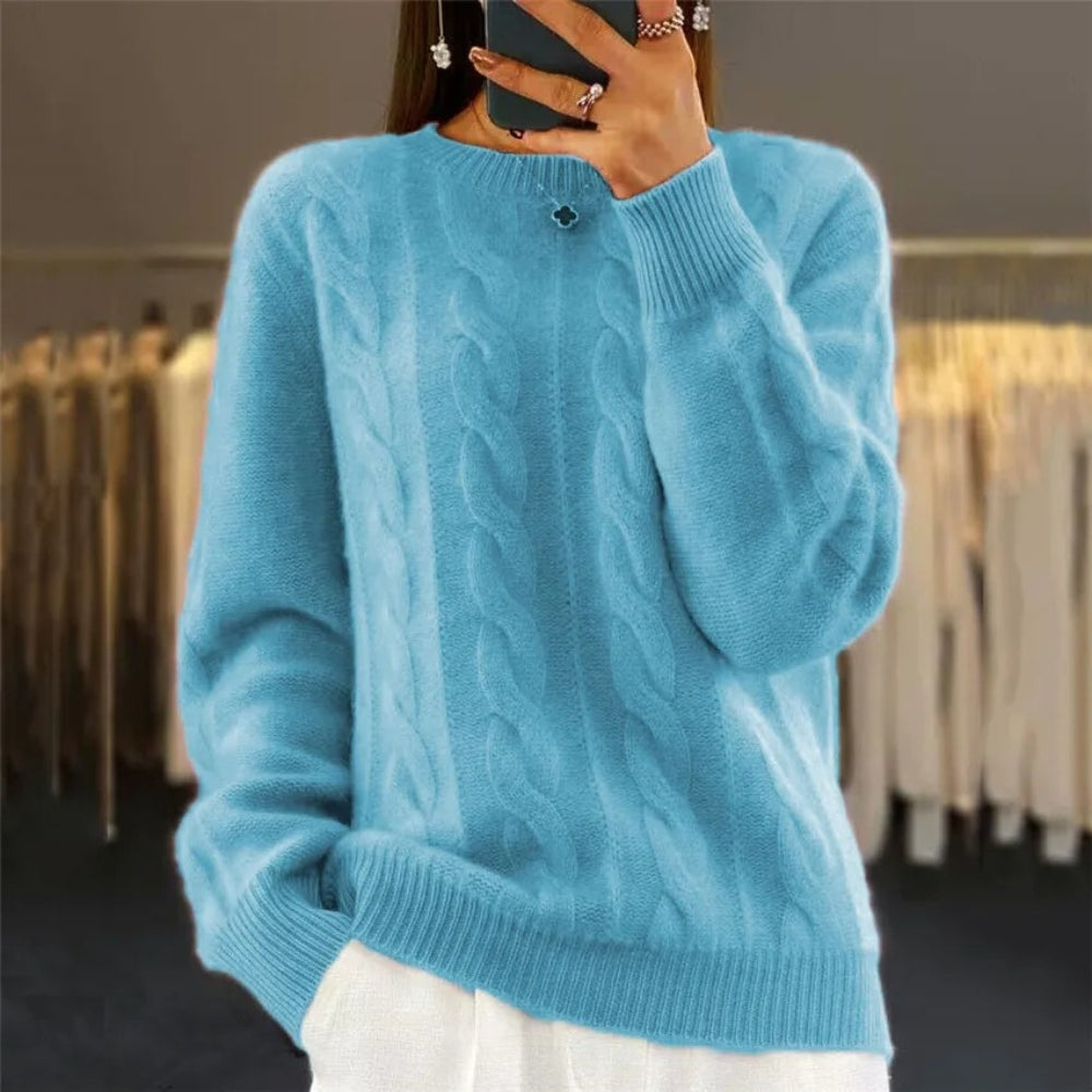 Soft knitted sweater with cable pattern