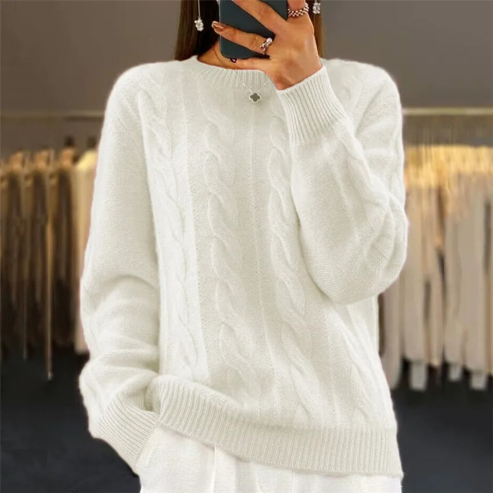 Soft knitted sweater with cable pattern