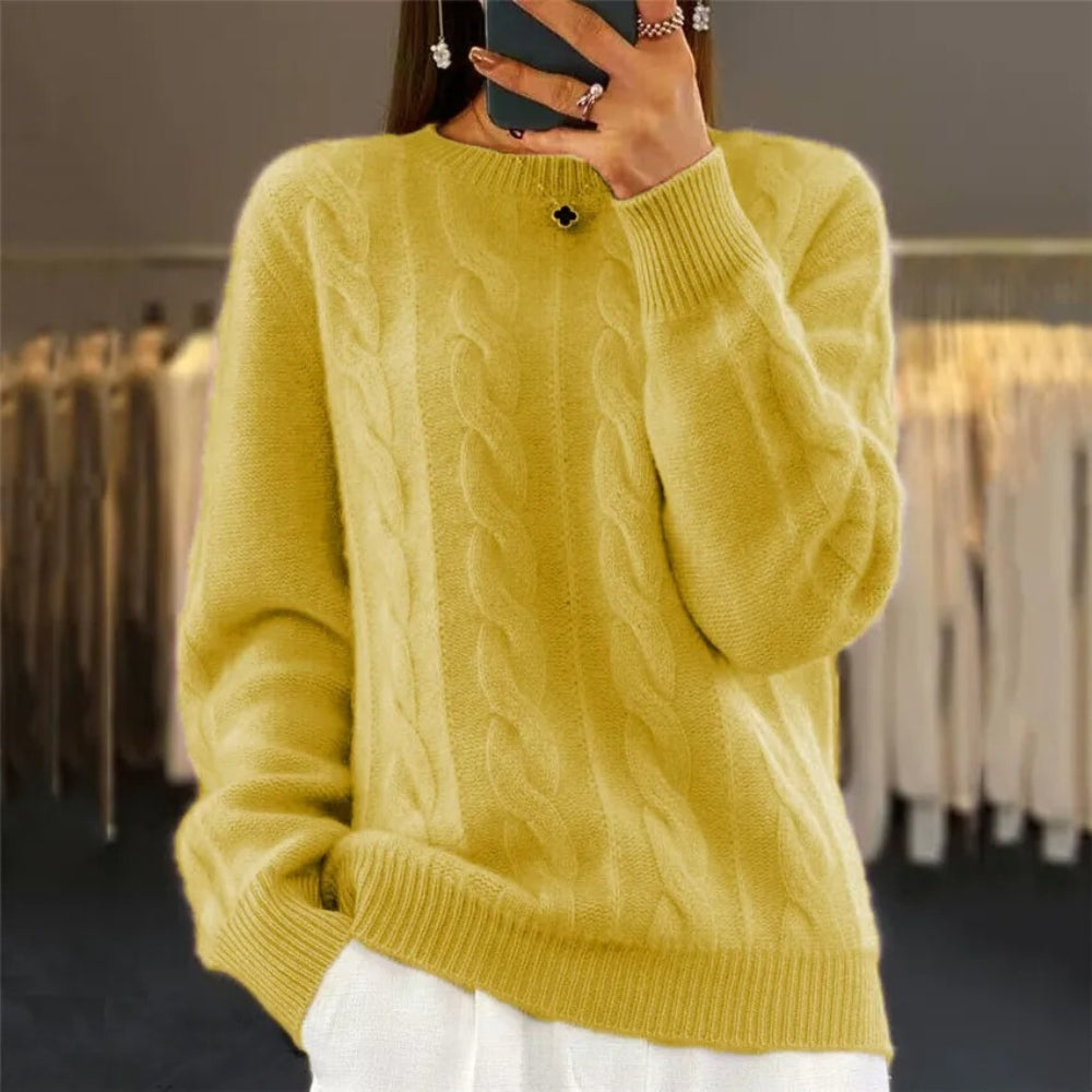 Soft knitted sweater with cable pattern