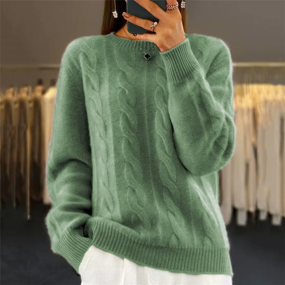 Soft knitted sweater with cable pattern