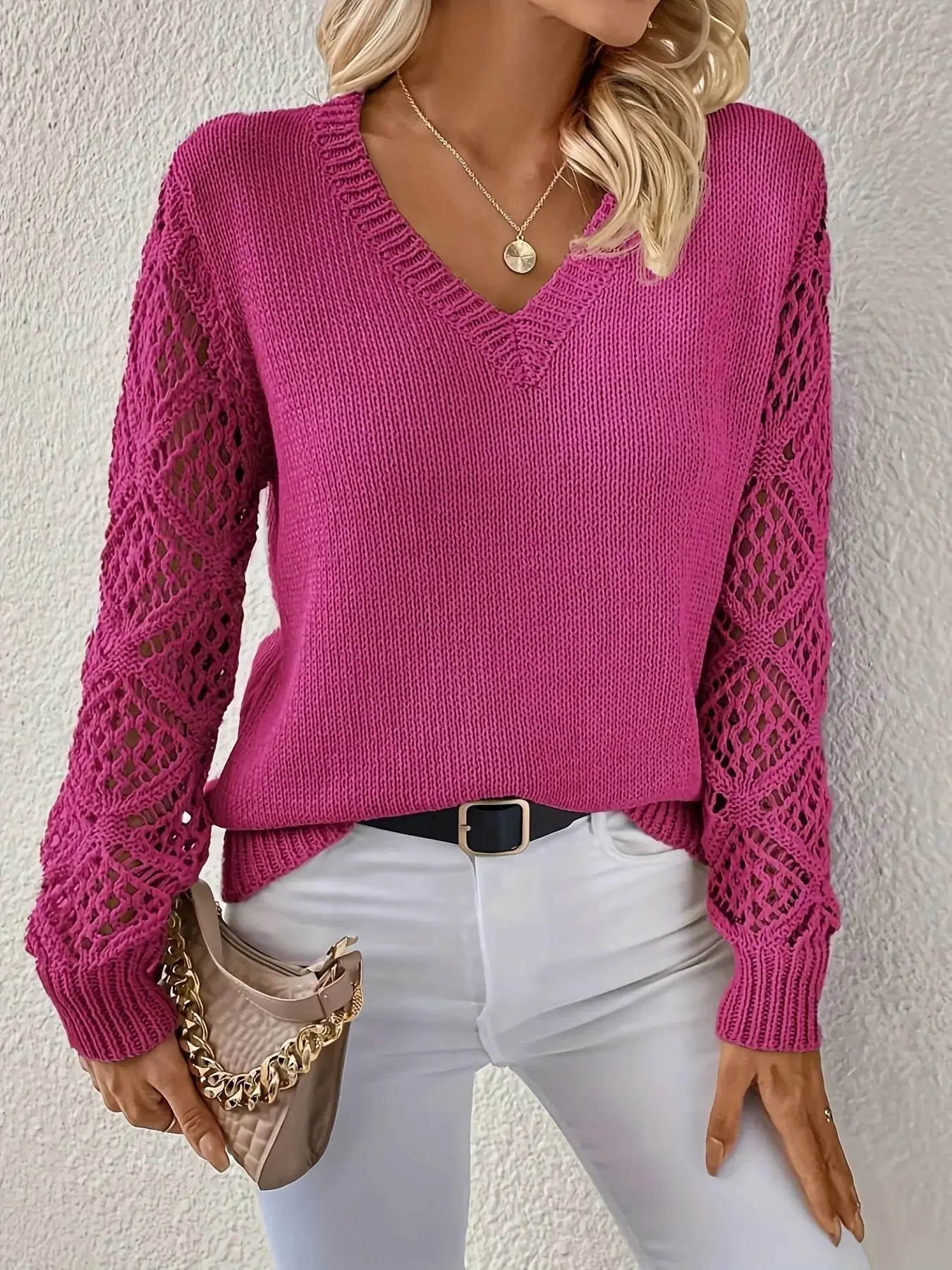 Women's knitted sweater with V-neck